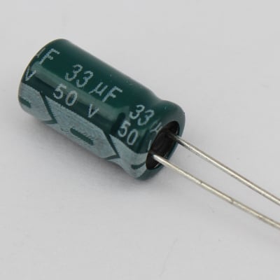Кондензатор електр.33MF 50V
